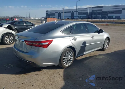 2016 Toyota Avalon Hybrid Limited z USA, uszkodzony, nr VIN 4T1BD1EB7GU054181